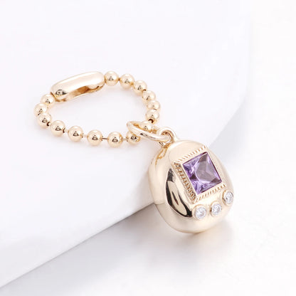 18K Gold Tamagotchi