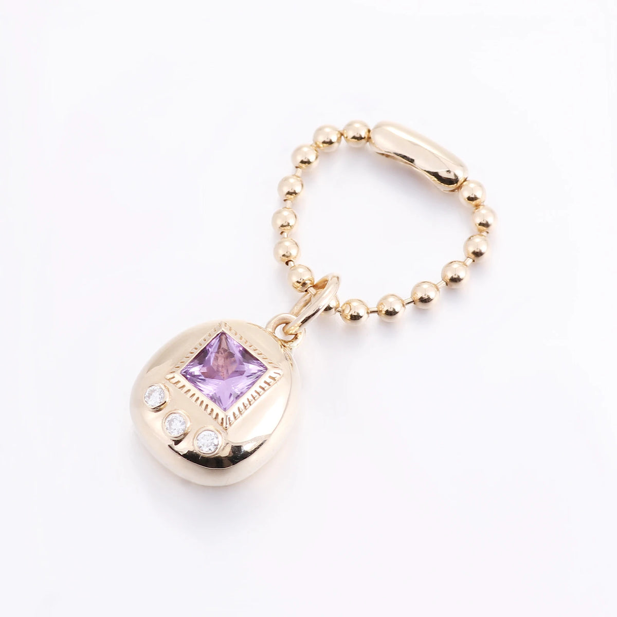 18K Gold Tamagotchi