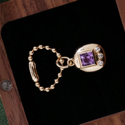 18K Gold Tamagotchi